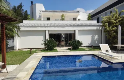 Casa com 5 suites a venda no condominio fechado jardim acapulco na praia do pernambuco guaruja sp