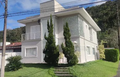 Casa com 04 suites a venda no condominio jardim albamar guaruja sp