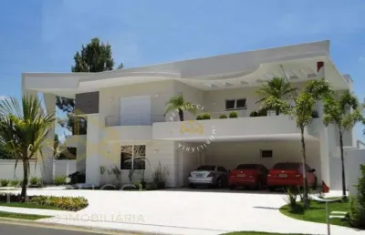 Casa com 5 dormitórios à venda, 595 m² por r$ 5.500.000,00 - loteamento alphaville campinas - campinas/sp
