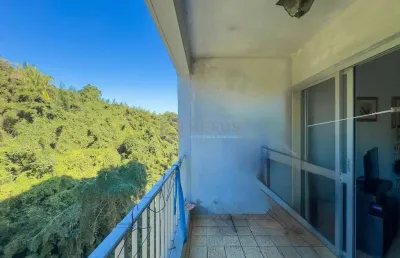 Apartamento com varanda na praia do tombo de 1 quarto com 1 vaga, guarujá-sp.