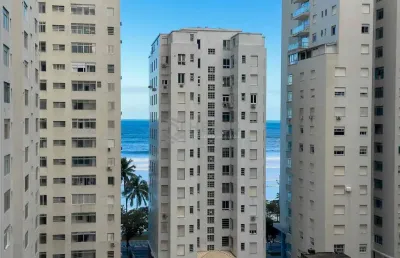 Apartamento com varanda e vista mar a uma quadra da praia das pitangueiras de 3 quartos, 1 vaga, gu