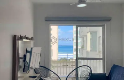 Apartamento com varanda e vista mar a uma quadra da praia das pitangueiras de 2 quartos com 1 vaga,