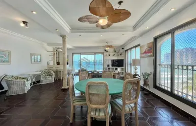 Apartamento frente mar com varanda, vista mar e lazer na praia das asturias, guaruja | hexus