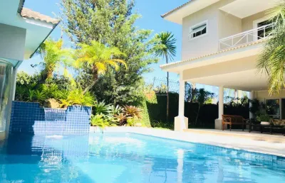 Casa em condomínio fechado com 4 quartos à venda na Rua Mesquitinha, Barra da Tijuca, Rio de Janeiro