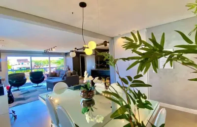 Apartamento semimobiliado com 2 suítes e living estendido