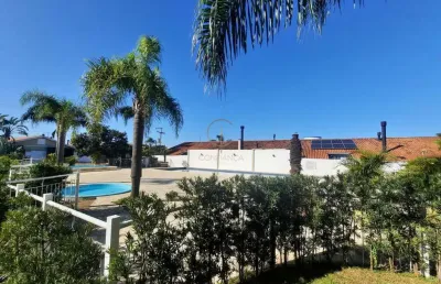 Casa térrea em condomínio com 03 dormitórios no estância velha em canoas