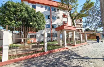 Apartamento de 02 dormitórios com uma de garagem coberta no centro