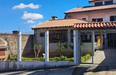 Casa com 3 quartos à venda no Guajuviras, Canoas 