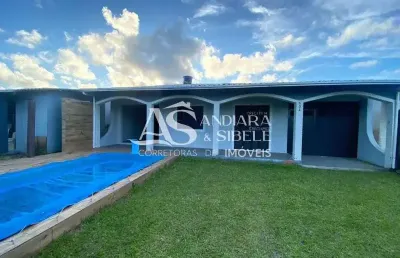 Bela casa com piscina próxima ao mar em nova tramandaí