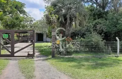 Excelente chácara  a venda em tramandai! fundos lagoa !
