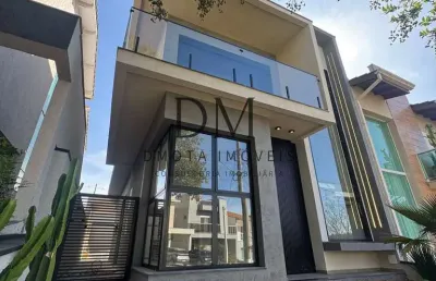 Uma casa com acabamento premium no condomínio parque das figueiras em mogi das cruzes