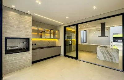 Viva o máximo do luxo, conforto e exclusividade nesta deslumbrante casa térrea