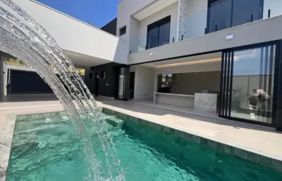Casa térrea moderna com 3 quartos, piscina aquecida e cozinha gourmet – condomínio jardins barcelona