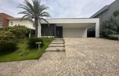 Imponente casa térrea com arquitetura moderna na região do alphaville, campinas-sp