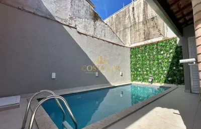 Casa geminada na mirim em praia grande – com piscina, churrasqueira e 3 vagas