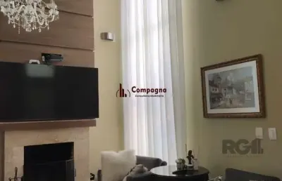 Casa em condomínio com 3 suítes, sala, cozinha, lareira, churrasqueira, piscina