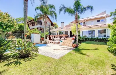 Casa em condomínio fechado com 3 quartos à venda na Avenida Firmino Octávio Bimbi, 255, Cavalhada, Porto Alegre