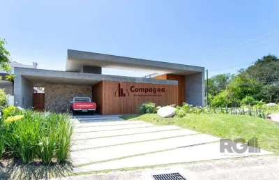 A casa le mans, uma residência térrea de esquina com 389,48m2 de área coberta