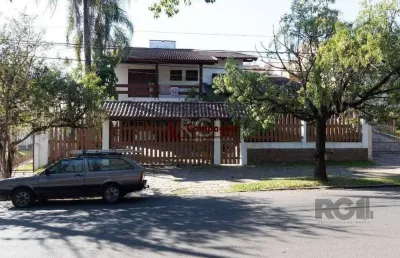 Casa com 4 quartos à venda na Rua Upamaroti, 794, Cristal, Porto Alegre
