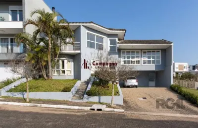 Casa em condomínio 3 dormitórios à venda vila nova porto alegre/rs