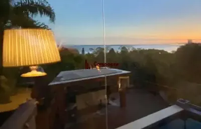 Casa com 4 quartos à venda na Rua Bororó, 157, Vila Assunção, Porto Alegre