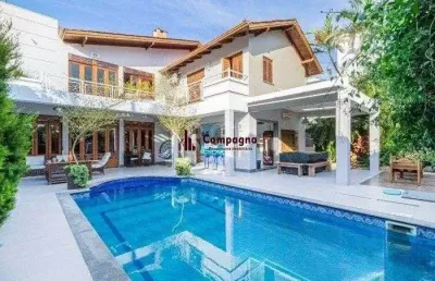 Excelente casa de  386m² com 04 dormitórios sendo 03 suítes.
