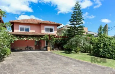 Casa em condomínio 4 dormitórios à venda belém novo porto alegre/rs