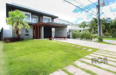 Casa em condomínio 4 dormitórios à venda belém novo porto alegre/rs