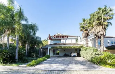 Casa no condomínio las rocas, vista para o guaíba, com 5 suítes