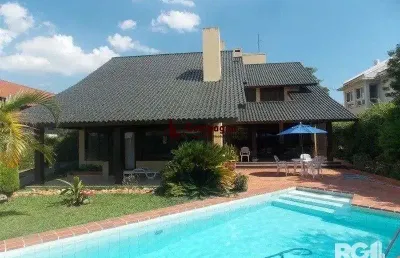 Casa em condomínio fechado com 4 quartos à venda na Avenida da Cavalhada, 5205, Cavalhada, Porto Alegre