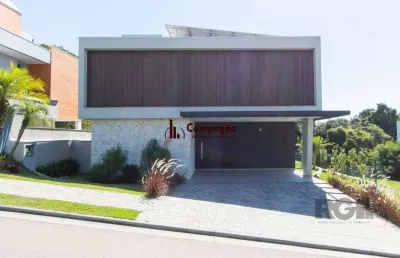 Casa em condomínio 4 dormitórios à venda vila nova porto alegre/rs