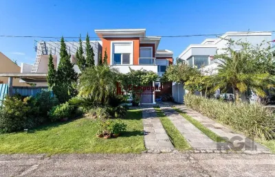 Casa em condomínio 4 dormitórios à venda belém novo porto alegre/rs