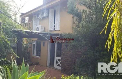 Casa em condomínio fechado com 3 quartos à venda na Rua Professor Carlos de Paula Couto, 500, Cavalhada, Porto Alegre