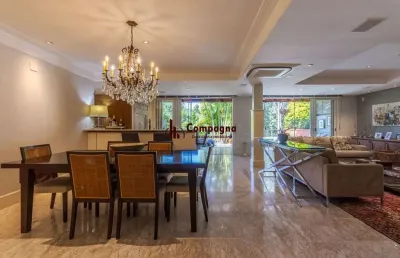 Casa em condomínio com 487m² | 4 dormitórios sendo 4 suítes, 3 vagas, no bairro