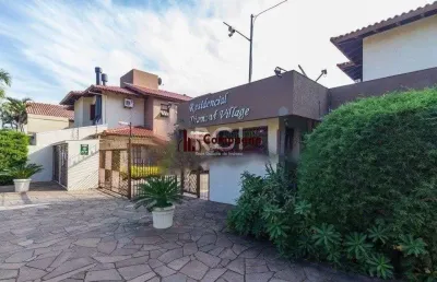 Excelente casa em condomínio com três (3) dormitórios, uma (1) suíte, duas (2)