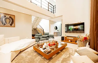 Linda casa mobiliada moderna no genesis 1 alphaville. 4 dormitórios sendo 2 suites e uma delas máster