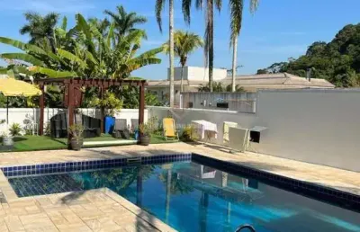 Casa em condomínio fechado praia da enseada guarujá sp.
