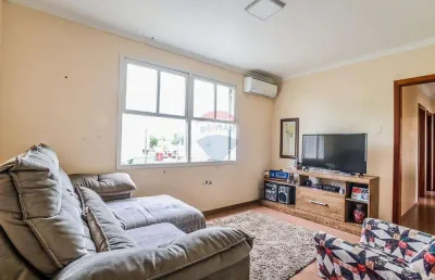 Amplo apartamento de 3 dormitórios com garagem coberta