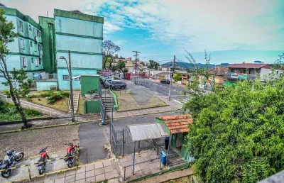 Amplo apartamento de 3 dormitórios com garagem coberta