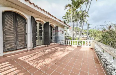Casa com 3 quartos à venda na Rua Oscar Tollens, 170, Santa Tereza, Porto Alegre