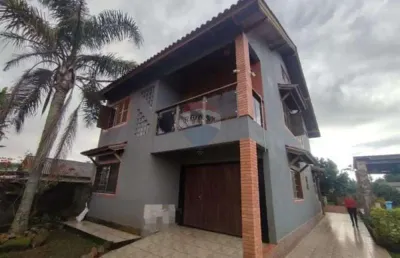Casa com 3 quartos à venda na Rua Do Stringuini, 143, Hípica, Porto Alegre