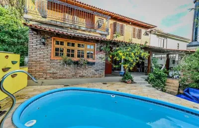 Casa em condomínio fechado com 4 quartos à venda na Acesso das Figueiras, 108, Santa Tereza, Porto Alegre