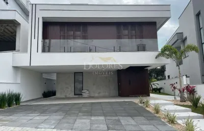Casa deslumbrante fundo para reserva com elevador em aruã brisas em mogi das cruzes.