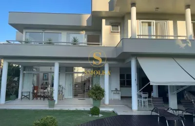 Casa em condomínio fechado com 6 quartos à venda na rua dos camuris, jurerê internacional, florianópolis, 605 m2 por r$ 7.500.000