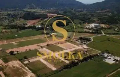 Terreno em condomínio fechado à venda na área rural, loteamento santa catarina, biguaçu, 361 m2 por r$ 188.000