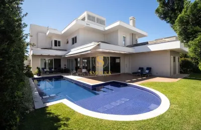 Casa em condomínio fechado com 4 quartos à venda na avenida dos dourados, jurerê internacional, florianópolis, 500 m2 por r$ 8.200.000