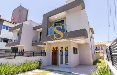 Casa em condomínio fechado com 3 quartos à venda na avenida luiz boiteux piazza, ponta das canas, florianópolis, 130 m2 por r$ 1.130.000