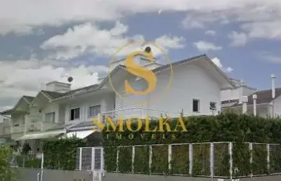 Casa em condomínio fechado com 3 quartos à venda na rua das piraúnas, jurerê internacional, florianópolis, 220 m2 por r$ 2.500.000