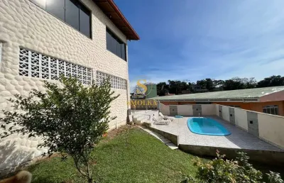 Casa em condomínio fechado com 4 quartos à venda na rua doutor eros merlin, morro da cruz, florianópolis, 495 m2 por r$ 1.500.000