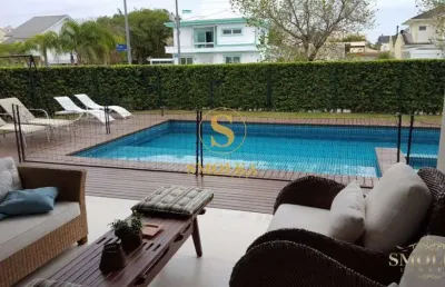 Casa em condomínio fechado com 6 quartos à venda na rua dos camuris, jurerê internacional, florianópolis, 495 m2 por r$ 6.500.000